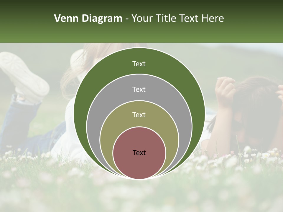 Two Young Girls Laying In The Grass With A Name Plate PowerPoint Template