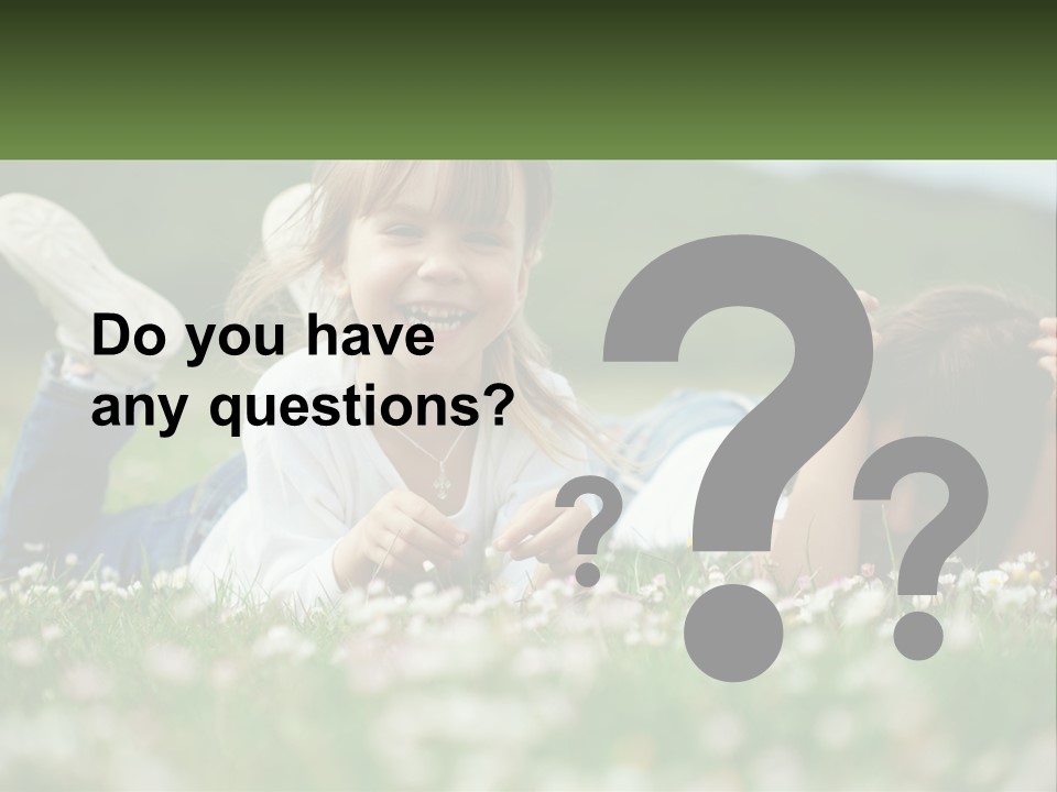Two Young Girls Laying In The Grass With A Name Plate PowerPoint Template