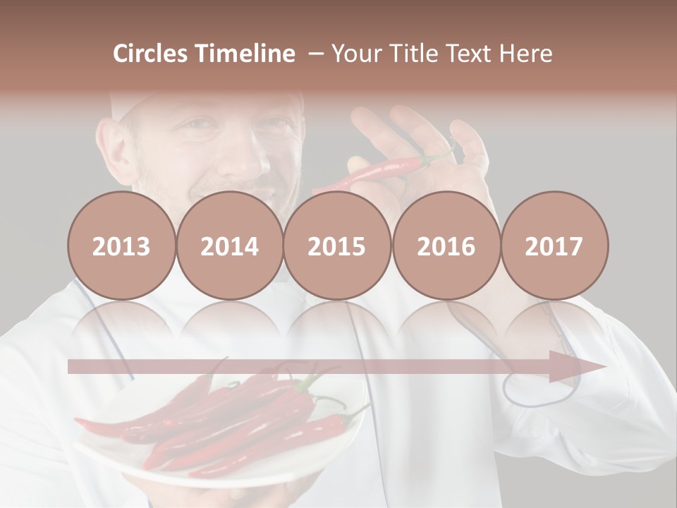 A Man In A Chef's Uniform Holding A Chili PowerPoint Template