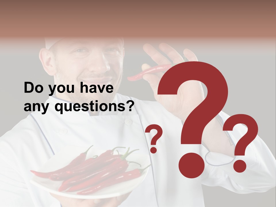 A Man In A Chef's Uniform Holding A Chili PowerPoint Template