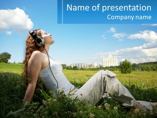 A Woman Sitting In The Grass Listening To Music PowerPoint Template