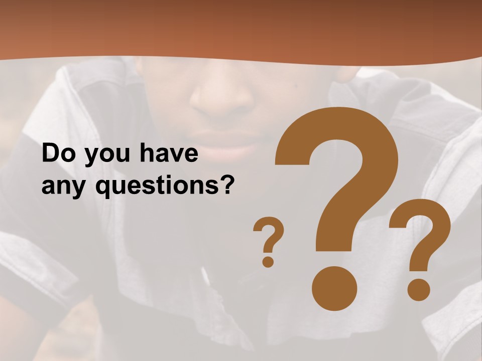 A Young Boy Is Posing For A Picture PowerPoint Template