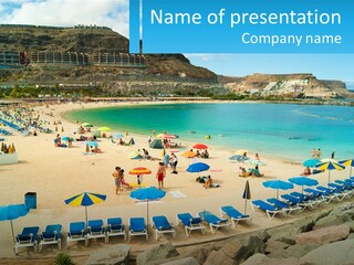 A Group Of People Sitting On Top Of A Sandy Beach PowerPoint Template