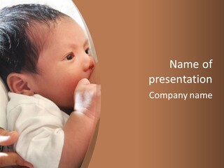 A Woman Holding A Baby In Her Arms PowerPoint Template