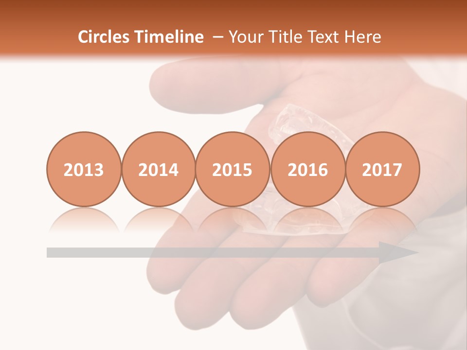 A Person Holding A Plastic Object In Their Hand PowerPoint Template