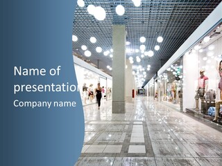A Group Of People Walking Through A Mall PowerPoint Template