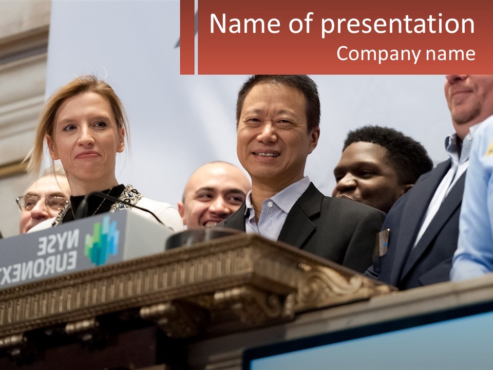 A Group Of People Standing Behind A Podium PowerPoint Template