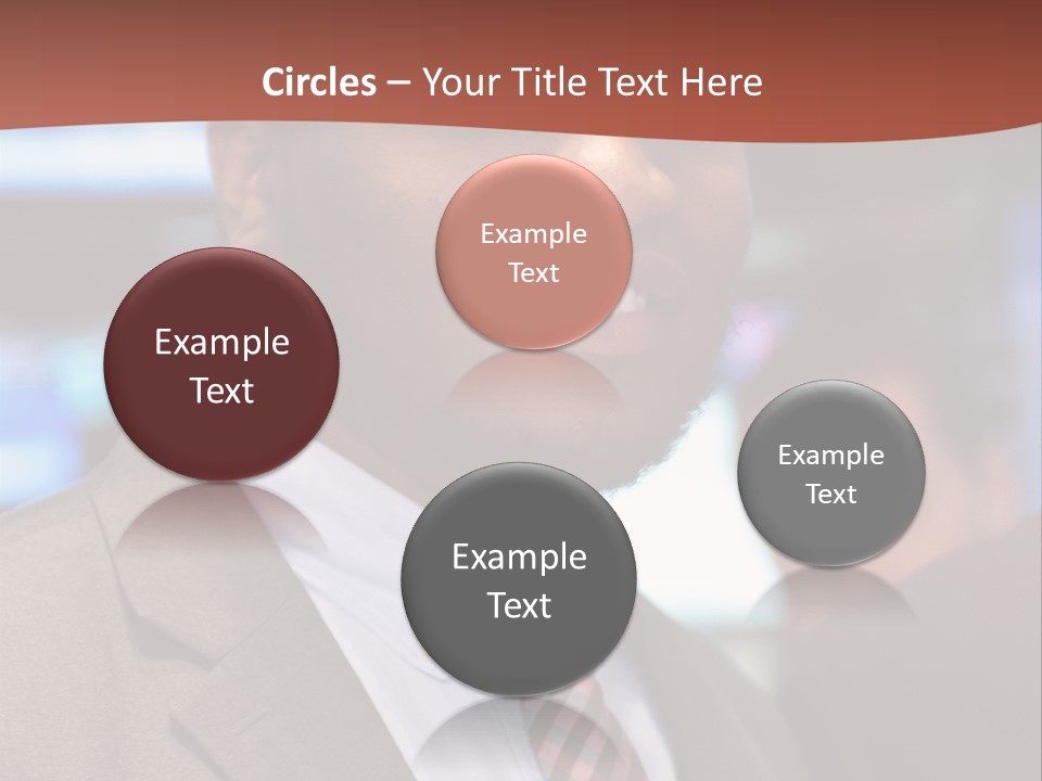 A Man In A Suit And Tie Is Smiling PowerPoint Template