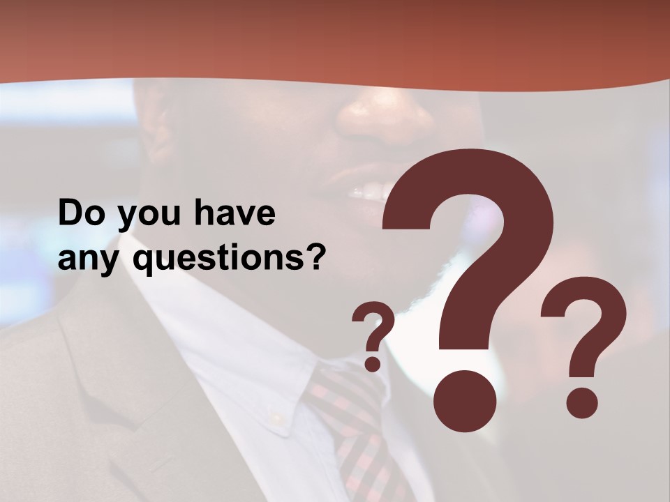 A Man In A Suit And Tie Is Smiling PowerPoint Template