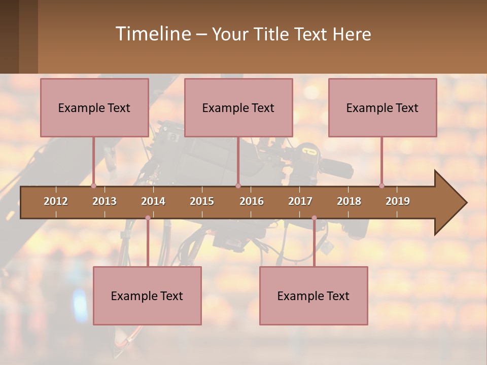 A Camera Attached To A Tripod In Front Of A Wall Of Oranges PowerPoint Template