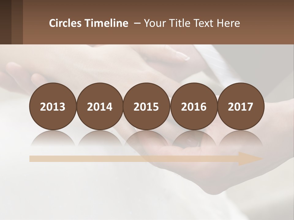 A Bride And Groom Holding Hands With A Ring On Their Finger PowerPoint Template