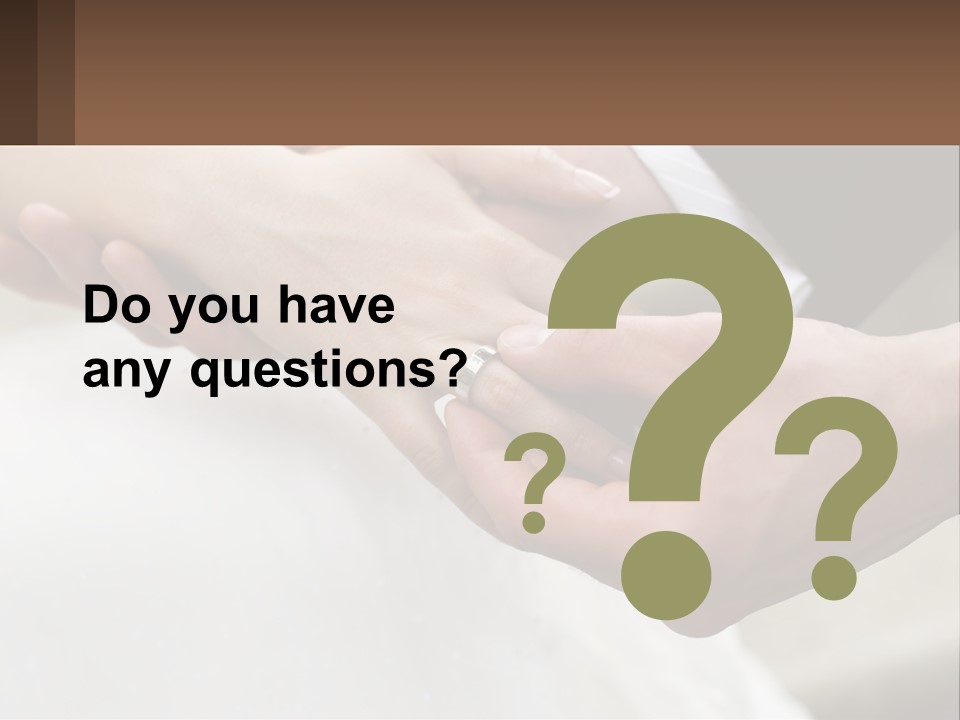 A Bride And Groom Holding Hands With A Ring On Their Finger PowerPoint Template