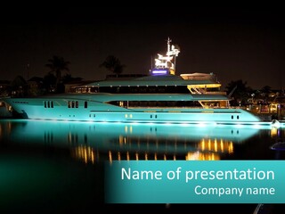 A Large White Boat In The Water At Night PowerPoint Template