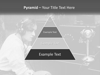 A Woman With Headphones Sitting In Front Of A Radio PowerPoint Template