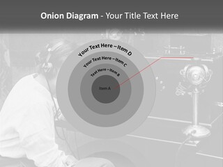 A Woman With Headphones Sitting In Front Of A Radio PowerPoint Template