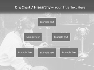 A Woman With Headphones Sitting In Front Of A Radio PowerPoint Template