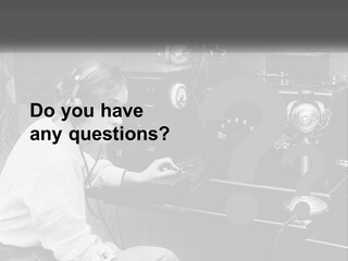 A Woman With Headphones Sitting In Front Of A Radio PowerPoint Template