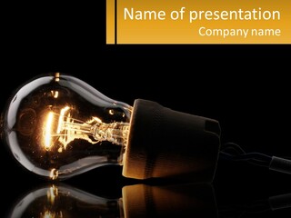 A Light Bulb With A Black Background PowerPoint Template