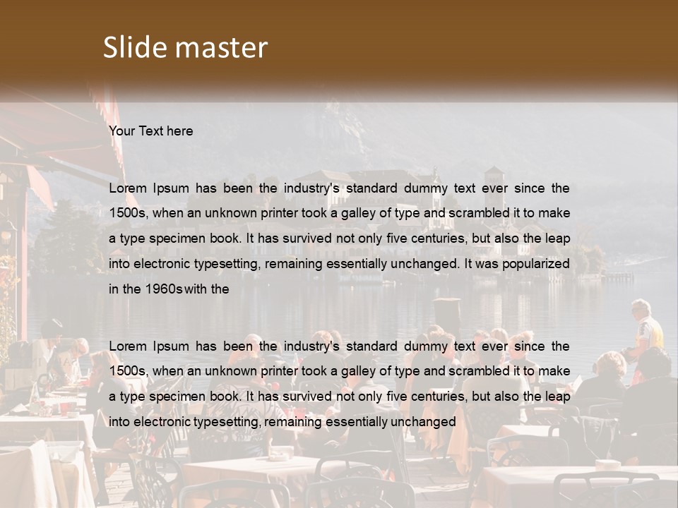 A Group Of People Sitting At A Table In Front Of A Lake PowerPoint Template