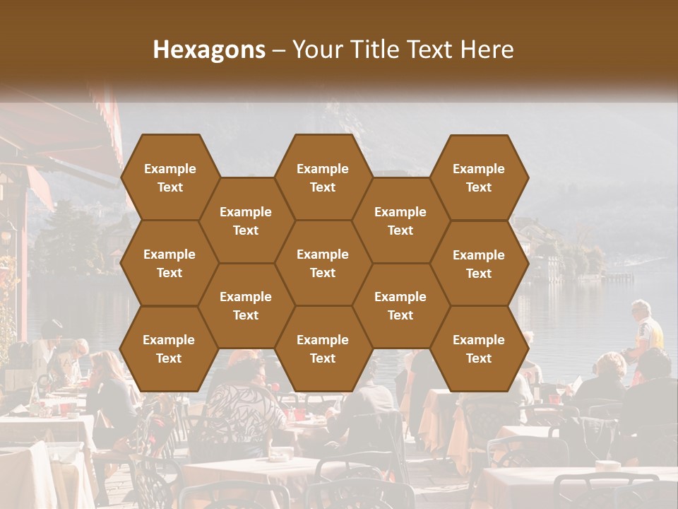 A Group Of People Sitting At A Table In Front Of A Lake PowerPoint Template