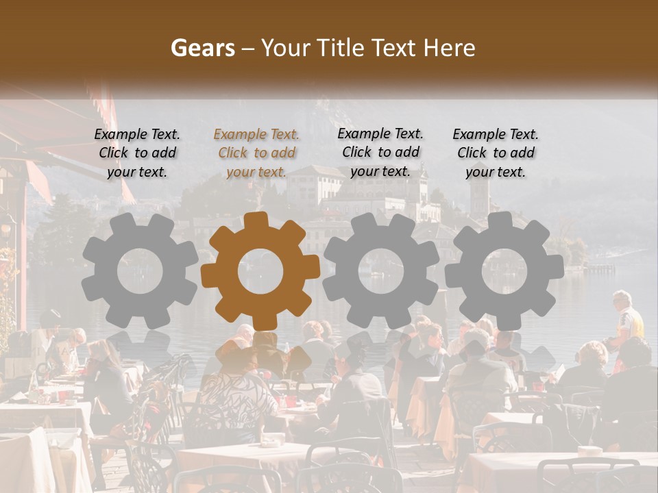 A Group Of People Sitting At A Table In Front Of A Lake PowerPoint Template