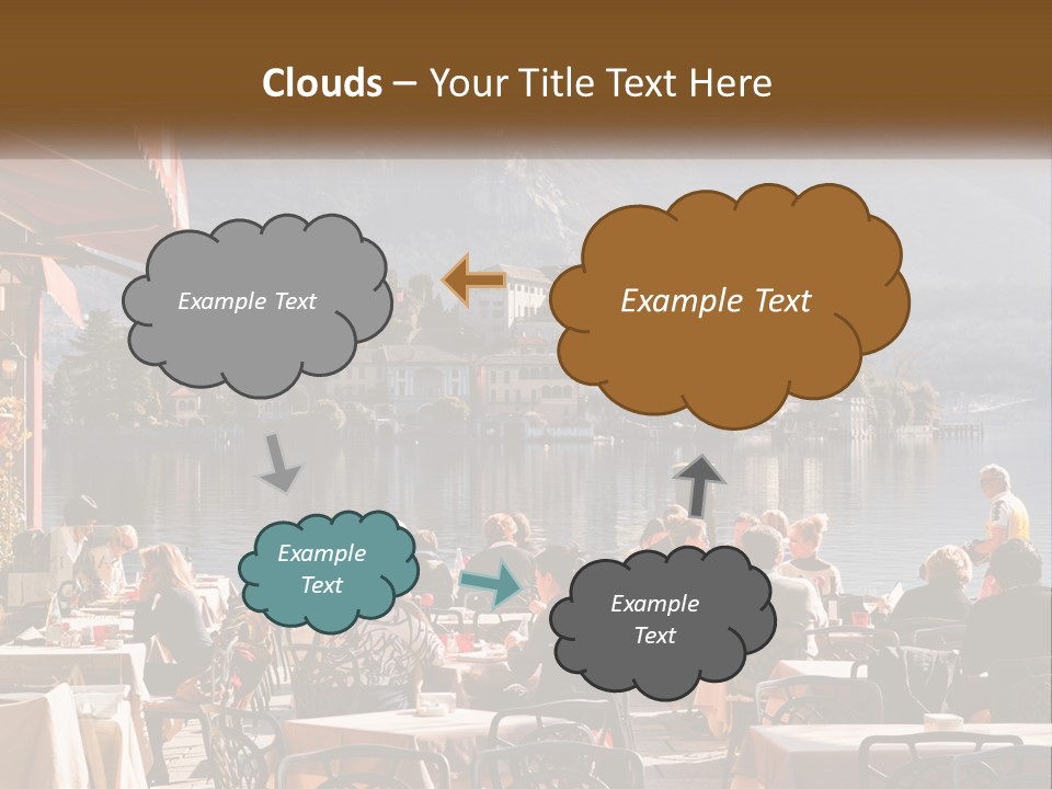 A Group Of People Sitting At A Table In Front Of A Lake PowerPoint Template