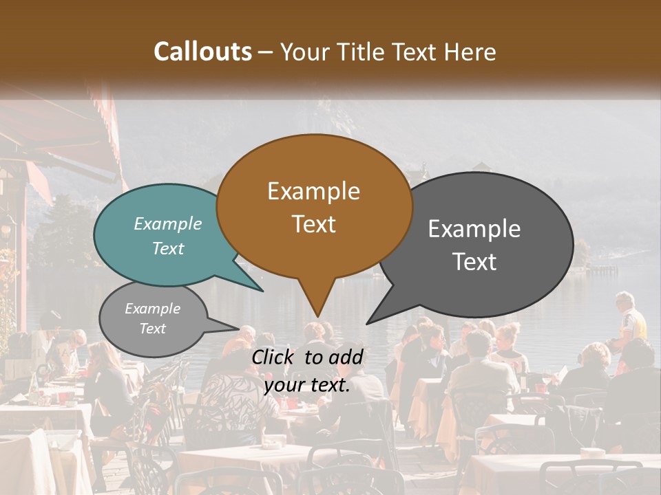 A Group Of People Sitting At A Table In Front Of A Lake PowerPoint Template
