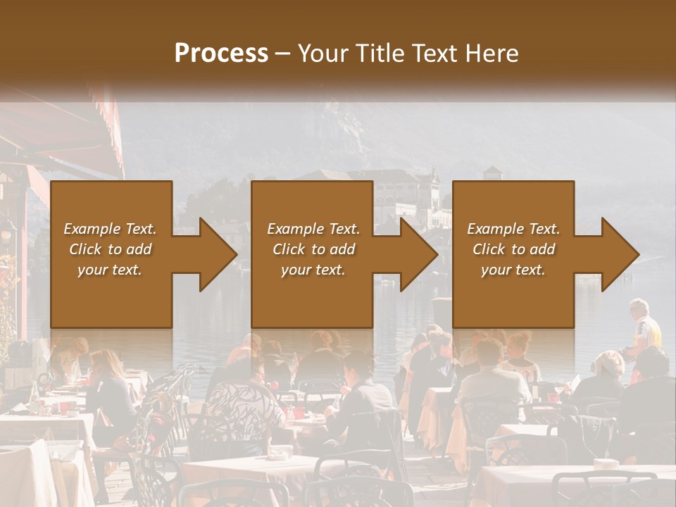 A Group Of People Sitting At A Table In Front Of A Lake PowerPoint Template