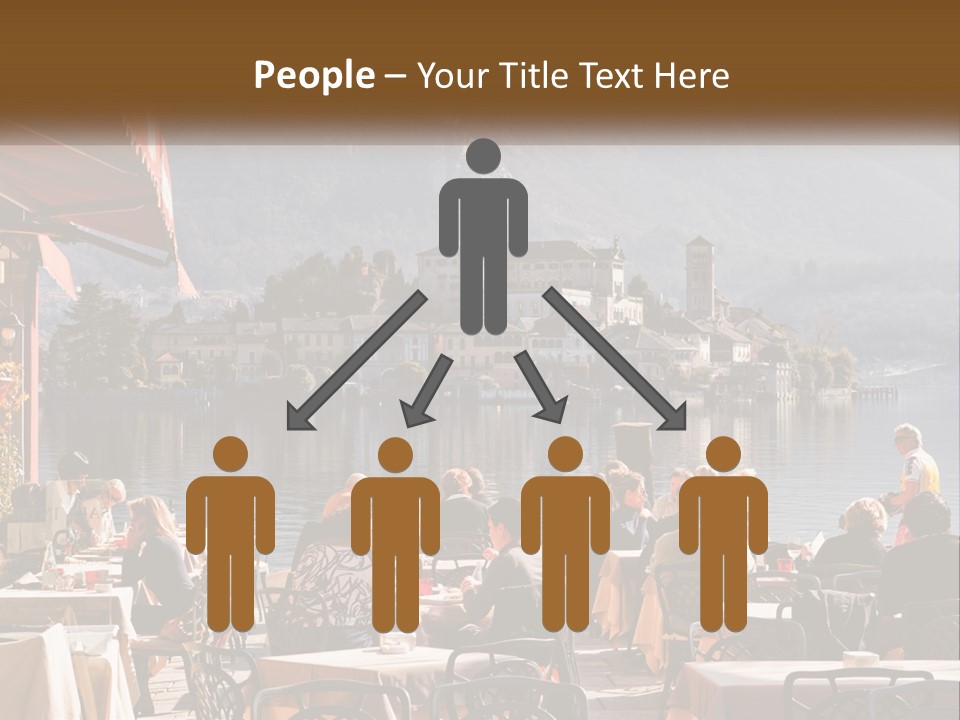 A Group Of People Sitting At A Table In Front Of A Lake PowerPoint Template