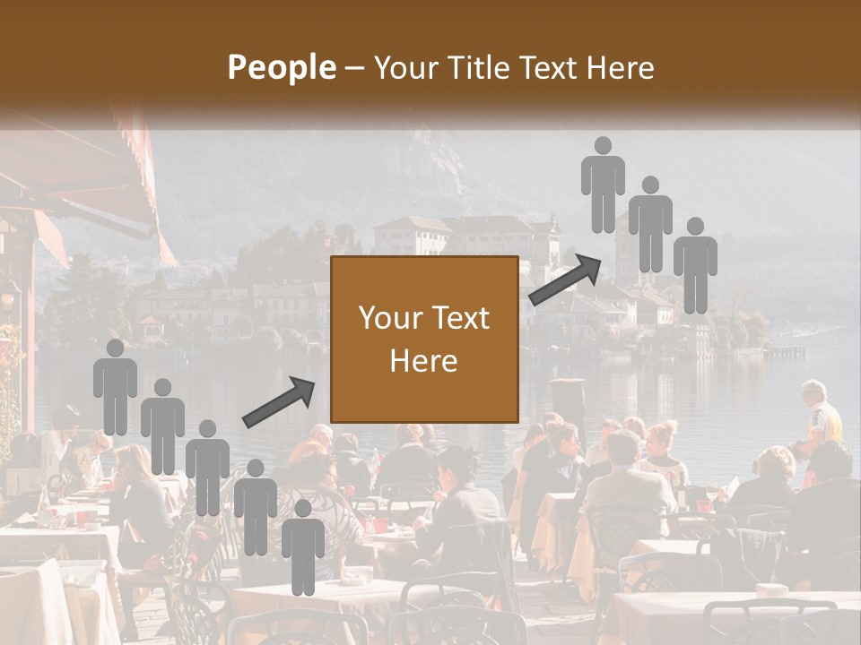 A Group Of People Sitting At A Table In Front Of A Lake PowerPoint Template