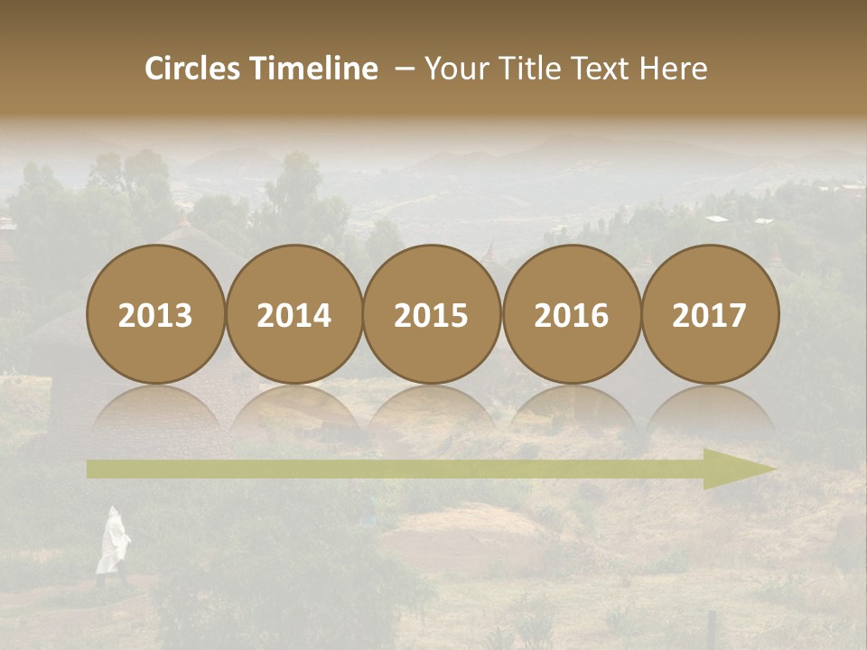 A Group Of Huts Sitting On Top Of A Lush Green Hillside PowerPoint Template