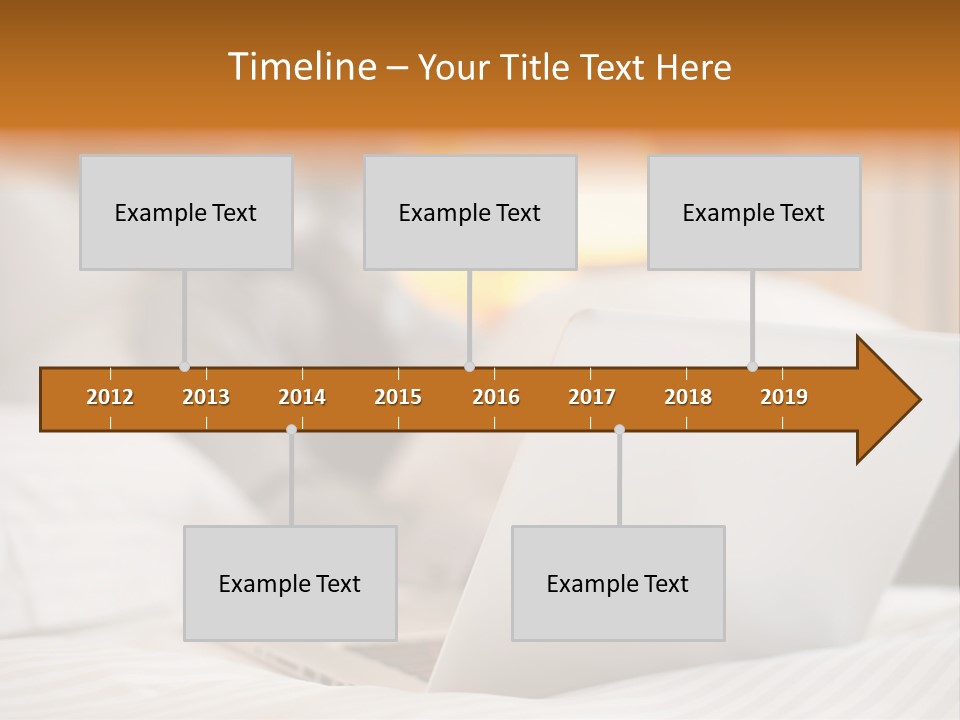 A Man Laying In Bed Next To A Laptop Computer PowerPoint Template