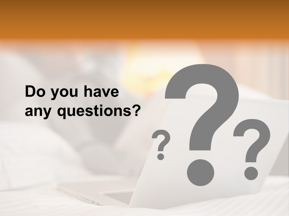 A Man Laying In Bed Next To A Laptop Computer PowerPoint Template