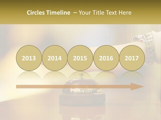 A Person's Hand Reaching Out To A Small Bell PowerPoint Template