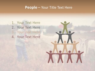 The Boy Feeds The Goat PowerPoint Template