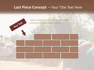 Girl Feeding A Giraffe PowerPoint Template