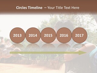 Girl Feeding A Giraffe PowerPoint Template