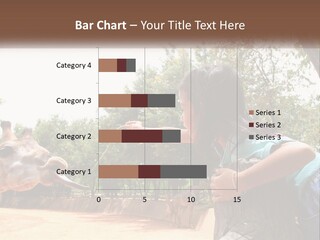 Girl Feeding A Giraffe PowerPoint Template