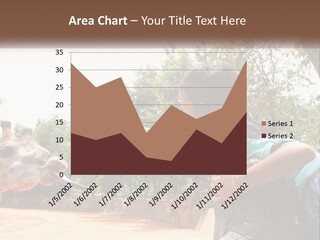 Girl Feeding A Giraffe PowerPoint Template