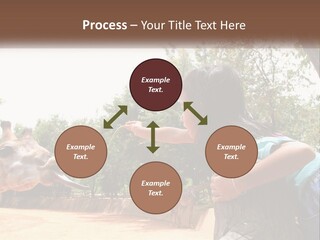 Girl Feeding A Giraffe PowerPoint Template