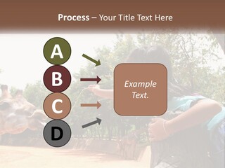 Girl Feeding A Giraffe PowerPoint Template
