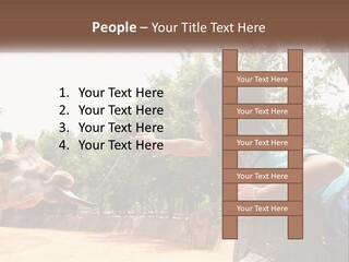 Girl Feeding A Giraffe PowerPoint Template