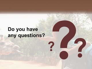 Girl Feeding A Giraffe PowerPoint Template