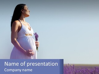 Pregnant Girl In A Flower Field PowerPoint Template