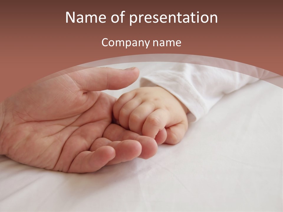 Baby Holding Dad's Finger PowerPoint Template