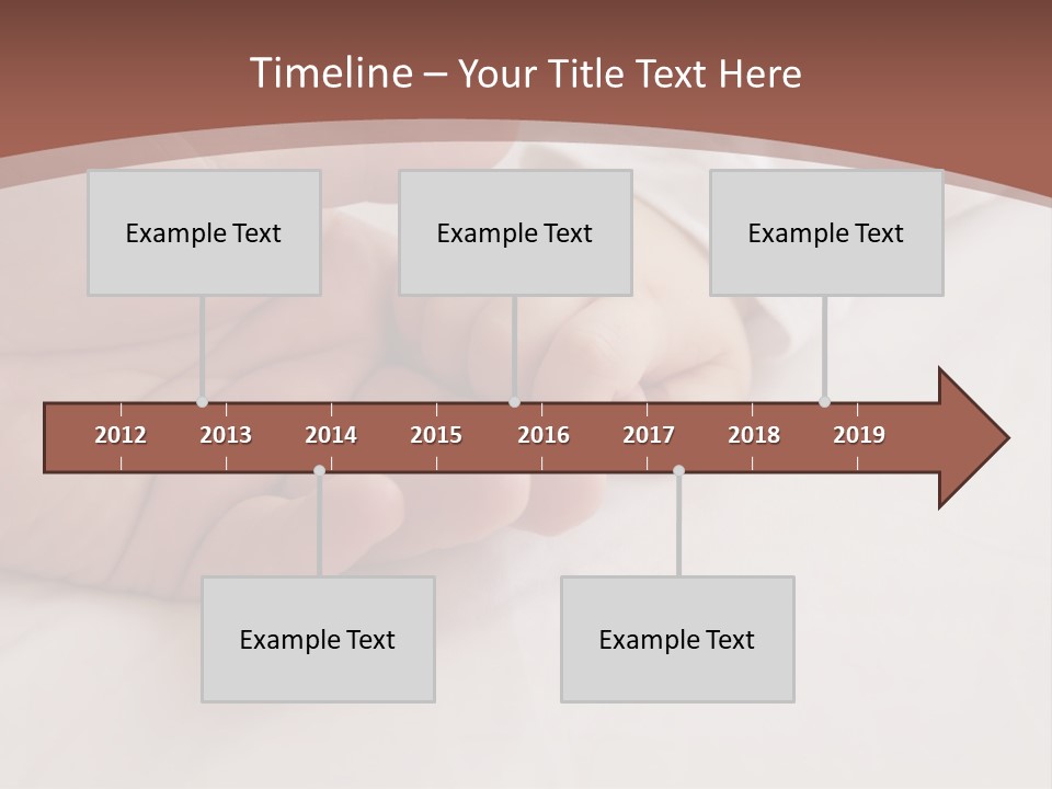 Baby Holding Dad's Finger PowerPoint Template