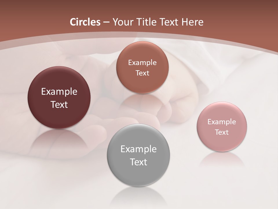 Baby Holding Dad's Finger PowerPoint Template