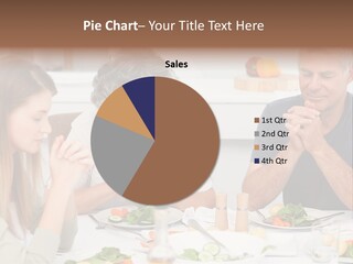 Family Praying At The Dinner Table PowerPoint Template
