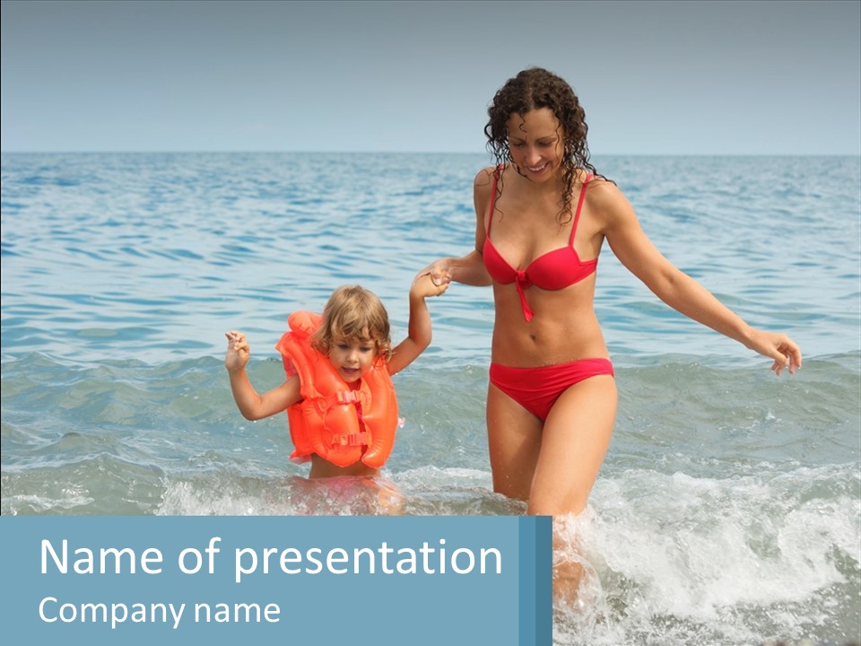 Mom With A Child By The Sea PowerPoint Template