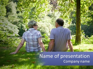 Mature Couple On The Grass PowerPoint Template